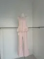 Elegant pink sleeveless lace peplum top and wide-leg trousers two-piece set - XS / Top And Bottom / Pink