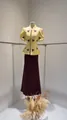 Detail view of yellow puff-sleeve embroidered top and wine-red maxi skirt set suit - XS / Top And Bottom / Yellow