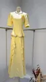 Elegant yellow evening gown featuring beaded neckline and ruffled fishtail design - XS / Top And Bottom / Yellow