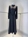 Vista detallada de un elegante vestido largo negro francés con mangas de malla - XS / Tops / Negro