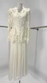 Elegant cream lace two-piece set featuring a long-sleeved top and pleated maxi skirt - XS / Top And Bottom / Apricot