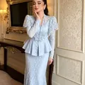 Elegant light blue V-neck lace peplum top and matching long skirt set for women - XS / Top And Bottom / Light Blue