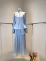 Elegant light blue two-piece set featuring a pleated skirt and floral applique long sleeve top - XS / Top And Bottom / Light Blue