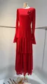 Elegant red tiered long-sleeved dress with floral brooch on mannequin - XS / Tops / Red