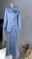 Detail view of light blue blazer with fabric flower and lace skirt set - Blue