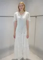 Detailed view of white heavy lace dress with V-neck and delicate floral embroidery - XS / Top And Bottom / White