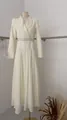 Elegant cream V-neck maxi dress with pleated skirt and waist belt - XS / Top And Bottom / Apricot