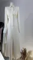 Detailed view of white pleated French maxi dress with bow collar and lace waist - XS / Slim Fit Model / Apricot
