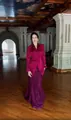 Elegant magenta blazer with rose detail and matching lace skirt in an ornate hallway - XS / Top And Bottom / Red