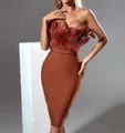 Close-up of elegant terracotta bandage dress featuring luxury ostrich feather bodice details - S / Tops / Dark Brown