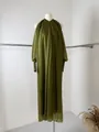 Elegant olive green long sleeve pleated maxi dress displayed on a white mannequin - XS / Green