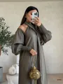 Elegant olive green long-sleeved pleated maxi dress with chic cold shoulder design for fall. - XS / Gray