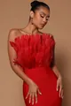 Detailed view of elegant red strapless bandage dress with ostrich feather bodice decor. - Red