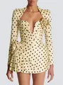 Elegant pale yellow polka dot mini dress with deep V-neck and decorative 3D floral accents - S / Tops / Yellow