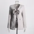 Front view of women's grey V-neck blazer with large 3D flower embellishment - S / Tops / Gray