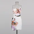Detailed macro shot of white strapless mini dress featuring elegant lily floral embroidery - S / Top And Bottom / White