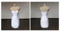 Elegante abito bianco attillato arricciato con spalline sottili e top in stile corsetto. - Bianco