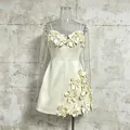 Detailed close-up of a cream A-line camisole dress featuring elegant 3D floral appliqués - S / Top And Bottom / Apricot
