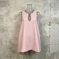 Elegant pink sleeveless dress featuring a sparkling rhinestone collar and keyhole detail - S / Pink
