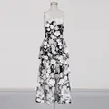 Detail view of elegant strapless dress with white 3D floral embroidery on black mesh - S / Tops / Black