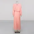 Elegant peach round neck long sleeve pleated maxi dress, back view detail on mannequin. - S / Pink