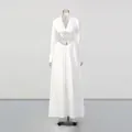 Elegant white two-piece set featuring a V-neck cropped top and matching long maxi skirt - S / Top And Bottom / White