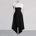 Front detail view of a French style black and white contrast dress with asymmetrical hem - S / Top And Bottom / Black