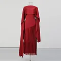 Elegant red evening dress featuring a unique cape design and long fringe hem details. - S / Top And Bottom / Red