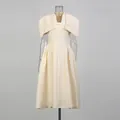Elegant vintage cream-colored midi dress featuring a mandarin collar and chic capelet sleeves - S / Top And Bottom / Apricot
