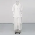 Vintage white V-neck tiered dress with puff sleeves and lace trim on mannequin - White