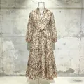 Front view of pastoral floral dress with V-neck, lantern sleeves, and belted waist - S / Top And Bottom / Printing