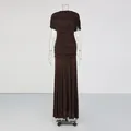Elegant dark brown ruched sleeveless maxi dress for women in a minimalist studio setting. - S / Coffee