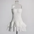 Detalle de minivestido blanco sin tirantes con volantes y bordado calado - S / Top Y Pantalón / Blanco