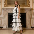 Elegant sleeveless white tiered maxi cake dress with decorative black ribbon straps - S / Tiered Style / White