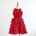 Detailed view of red sleeveless tiered ruffle dress with high waist design - S / Red