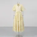 Full view of elegant cream V-neck dress with puff sleeves and floral lace embroidery - S / Yellow