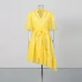 Detailed view of yellow V-neck lace dress with puff sleeves and asymmetrical hemline - S / Top And Bottom / Yellow