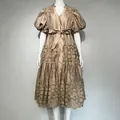 Detail view of elegant champagne French style dress with puff sleeves and lace patchwork. - S / Khaki