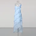 Light blue ruffled sleeveless dress with asymmetric hem and flower detail detail view - S / Tops / Blue