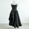 Elegant black halter dress featuring a pleated corset bodice and a voluminous ruffled skirt. - S / Top And Bottom / Black