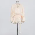 Elegant champagne pleated mini dress with bubble sleeves and ruffled hem details - S / Top And Bottom / Apricot