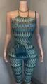 Full detail of a stylish printed halter neck backless jumpsuit displayed on a mannequin - S / Top And Bottom / Geometric Wave Print