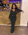 Elegante completo due pezzi nero a coste con fiocco sul davanti e maniche lunghe da donna. - Taglia S / Top E Pantaloni / Nero