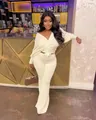 Dettagli della trama a costine e del fiocco su questo completo bianco per il tempo libero - Taglia S / Top E Pantaloni / Bianco