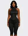 Front view detail of a chic black halter jumpsuit with white polka dots and corset waist - S / Top And Bottom / Black