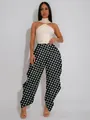 Elegant high-waisted wide-leg polka dot pants paired with a cream halter neck bodysuit top - S / Bottoms / Black