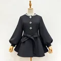Elegant black round neck jacket featuring rhinestone collar and puff sleeves with tie - M / Tops / Black