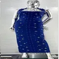 Close-up of a royal blue halter neck dress featuring sparkling rhinestone patterns throughout - S / Top And Bottom / Blue