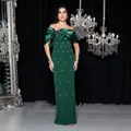 Elegant emerald green off-shoulder evening gown with bow and sparkling rhinestone detail - S / Dresses / Dark Green