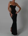 Elegant black bandage maxi dress featuring waist cut-outs and luxury golden heart accents. - Top And Bottom / S / Black